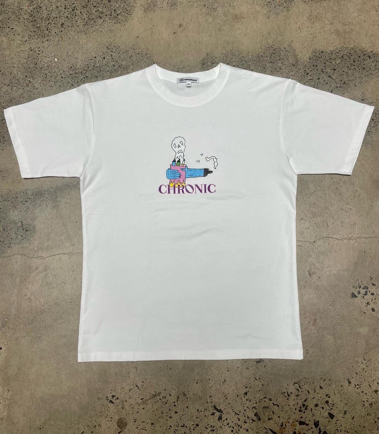 Drop 02 — Chronic ghost tee flat lay